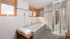 Master en-suite has a double bath and a separate steam shower cubicle